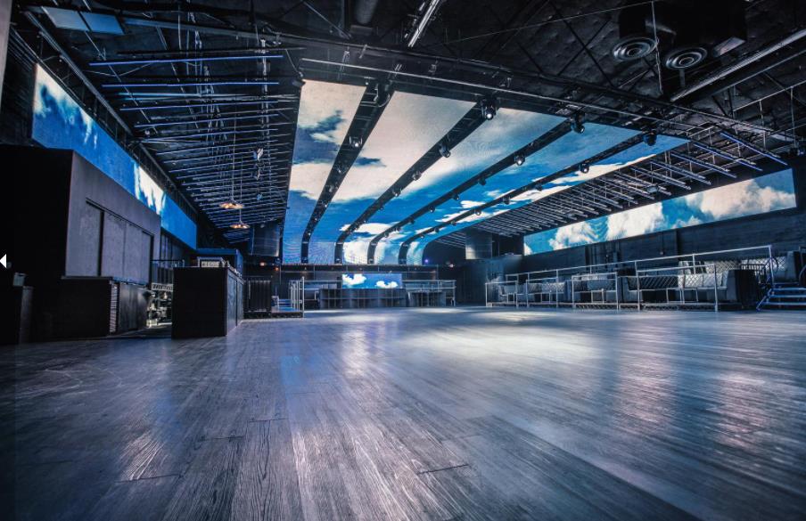 Who can serve as an exhibition stand construction company?